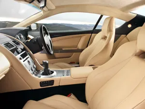 Preview Wallpaper Aston Martin, Db9, 2006, Beige, Interior, Salon Steering Wheel, Speedometer Wallpaper