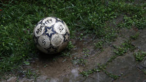 Preview Wallpaper Ball, Football, Dirt, Grass Wallpaper