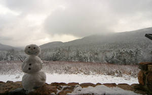 Preview Wallpaper Snowman, Winter, Mountains, Trees, Fog, Clouds Wallpaper