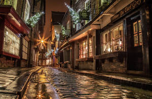Preview Wallpaper Street, Houses, Road, Paving, Windows, Lights, Shopping, Evening, Night, England, Christmas, New Year Wallpaper