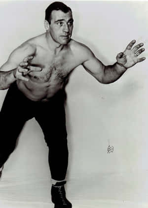 Primo Carnera - The Italian Boxing Legend On A West Coast Wrestling Card Wallpaper