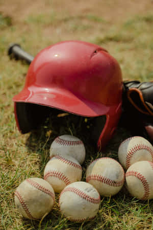 Professional Baseball Player Swinging A Baseball Bat Wallpaper