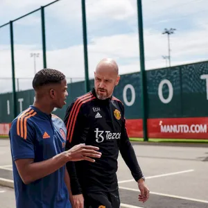 Professional Football Coach Tyrell Malacia In Action Wallpaper