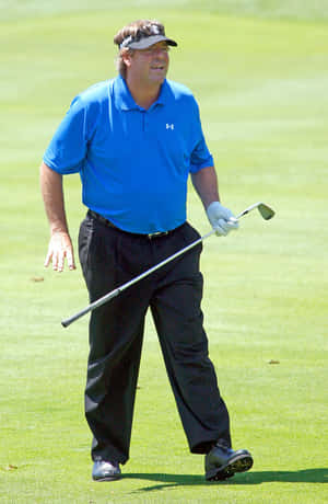 Professional Golfer, Steve Lowery, Mid Play On A Sunny Day At The Golf Course Wallpaper