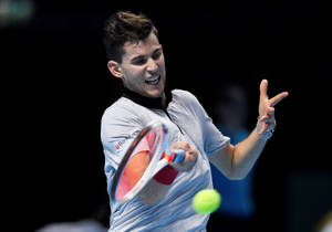 Professional Tennis Player Dominic Thiem In Action Wallpaper