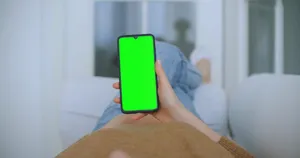 Professional Vlogger Studio Setup With Green Screen Wallpaper