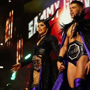 Professional Wrestler, Sammy Guevara, Posing With Tay Melo. Wallpaper