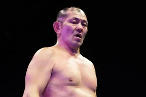 Professional Wrestlerin Ring Lighting Wallpaper