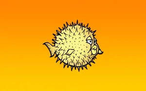 Puffer Fish Gracefully Swimming Through The Deep Blue Ocean. Wallpaper
