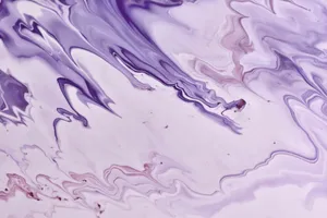 Purple And White Swirls On A Surface Wallpaper