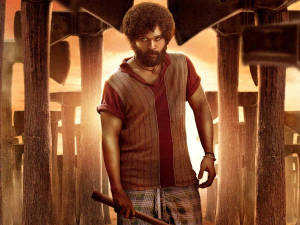 Puspa Fiercely Holding His Axe Wallpaper