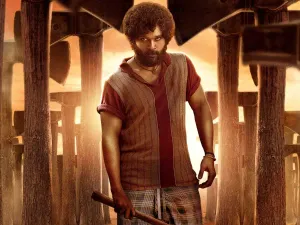 Puspa Fiercely Holding His Axe Wallpaper