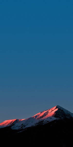 Qhd Mountaintop Under Blue Sky Wallpaper