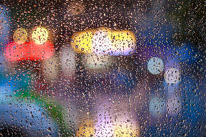 Qhd Rainy Blurred Lights Wallpaper