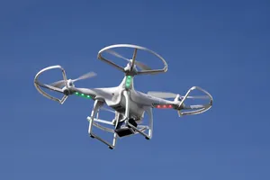 Quadcopter Drone In Flight Wallpaper
