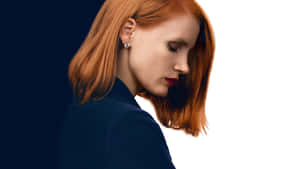 Radiant Jessica Chastain Posing In A Stylish Outfit Wallpaper