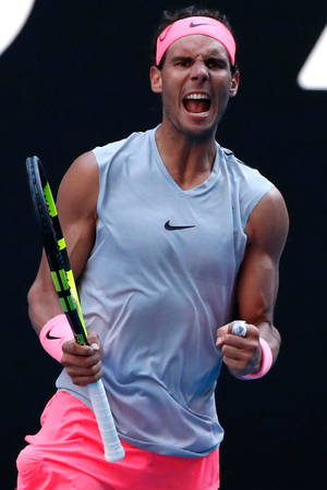 Rafael Nadal In An Animated Posture On Court Wallpaper