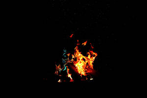 Raging Fire On Black Desktop Wallpaper