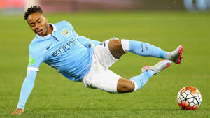 Raheem Sterling Slipping On The Ground Wallpaper