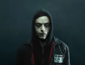 Rami Malek Posing For A Photoshoot Wallpaper