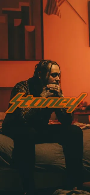 Rap Artist Contemplative Pose Stoney Wallpaper