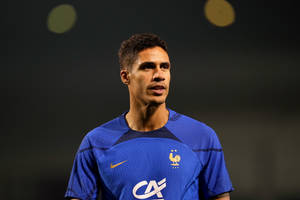 Raphael Varane Royal Blue Gold Wallpaper