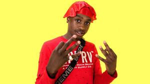 Rapper Lil Tjay Cool Pose Wallpaper