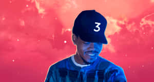 Rapperin Blue Hat Against Red Sky Wallpaper