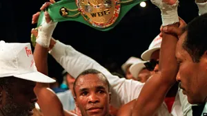 Ray Leonard Holding Up His Title Belt Wallpaper