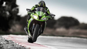 Ready, Set, Go! Get This Racing Green Kawasaki Ninja And Take It For A Spin. Wallpaper