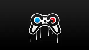 Red And Blue Gaming Laptop Controller Wallpaper