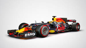 Red Bull F1 Racing Car In Action Wallpaper