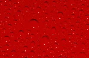 Red Color Surface With Drops Wallpaper