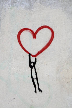 Red Heart And Man Hanging Drawing Wallpaper