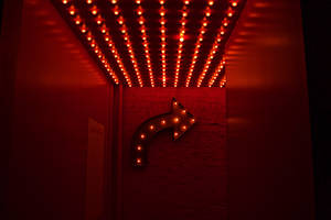 Red Marquee Light Going Right Wallpaper