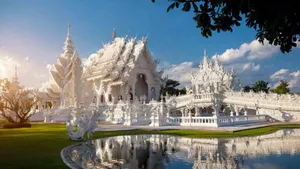 Reflection In Front Of White Temple In Chiang Rai Wallpaper