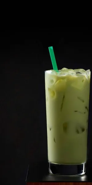 Refreshing Matcha Tea In A Traditional Bowl Wallpaper