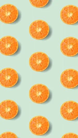 Refreshingly Vibrant Sliced Oranges Pattern Wallpaper