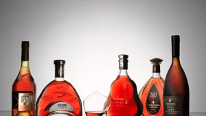Relax With A Smooth Glass Of Hennessy Wallpaper