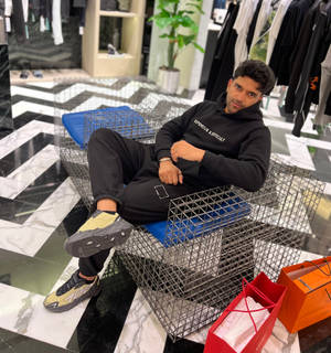 Remarkable Guru Randhawa Lounging Casually Wallpaper