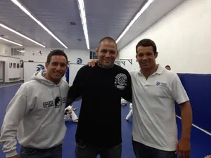 Renato Sobral With Friendsat Gym Wallpaper