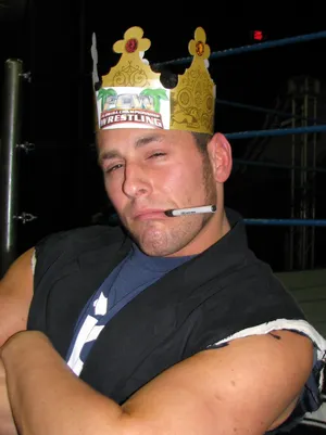 Renowned Wrestler Colt Cabana In Action Wallpaper