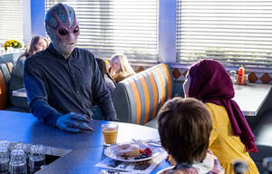 Resident Alien In The Restaurant Wallpaper