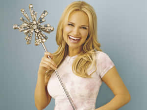 Resplendent Kristin Chenoweth Capturing Hearts With Her Enchanting Smile Wallpaper