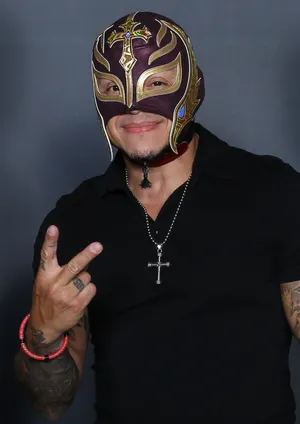 Rey_ Mysterio_ Posing_with_ Peace_ Sign Wallpaper