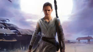 Rey, With Lightsaber In Hand, Prepares To Take On The Dark Side Wallpaper