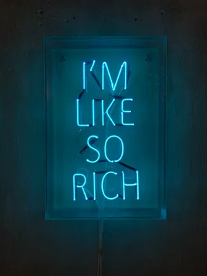 Rich Quote On Neon Blue Iphone Wallpaper