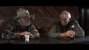 Richard Farnsworth Cowboy Drinking At Bar Wallpaper