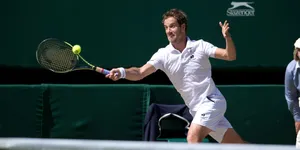 Richard Gasquet Making A Dynamic Run For The Ball During A Match Wallpaper