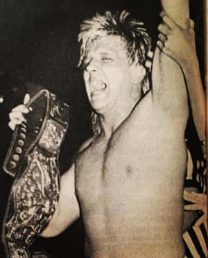 Ricky Morton Celebrating Victorywith Belt Wallpaper